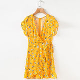 YELLOW FLORAL MINI ITS A WRAP DRESS - B ANN'S BOUTIQUE, LLC