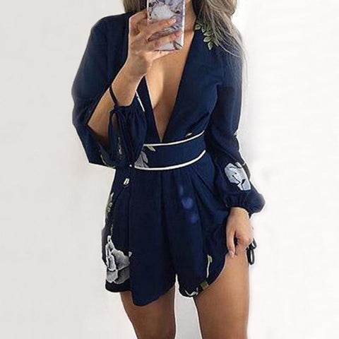 BACKLESS NAVY FLORAL ROMPER - B ANN'S BOUTIQUE