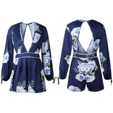 BACKLESS NAVY FLORAL ROMPER - B ANN'S BOUTIQUE