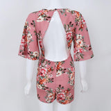 FLORAL FLARE SLEEVE ROMPER - B ANN'S BOUTIQUE