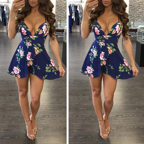 NEVA’S NAVY FLORAL ROMPER - B ANN'S BOUTIQUE