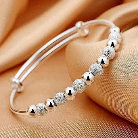 SILVER CHARM BANGLE BRACELET - B ANN'S BOUTIQUE, LLC