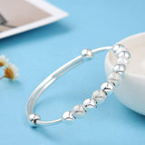 SILVER CHARM BANGLE BRACELET - B ANN'S BOUTIQUE, LLC