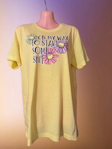 ON MY WAY TO START SOME SH*T – BUTTER YELLOW GRAPHIC TEE